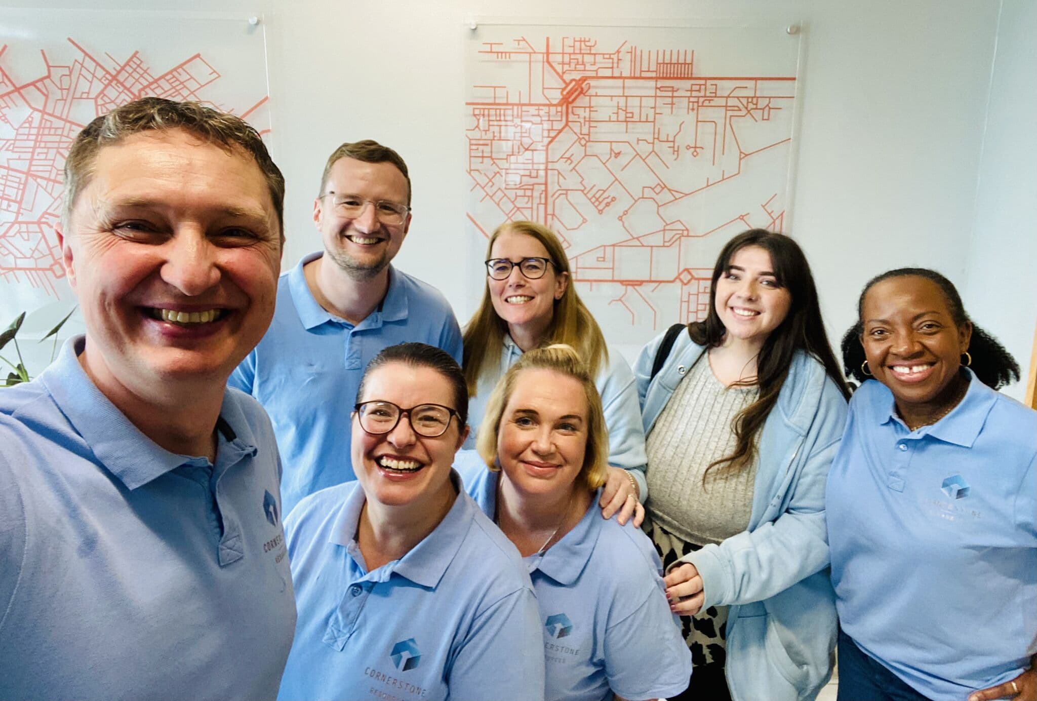 Cornerstone Resources team all wearing branded t-shirts
