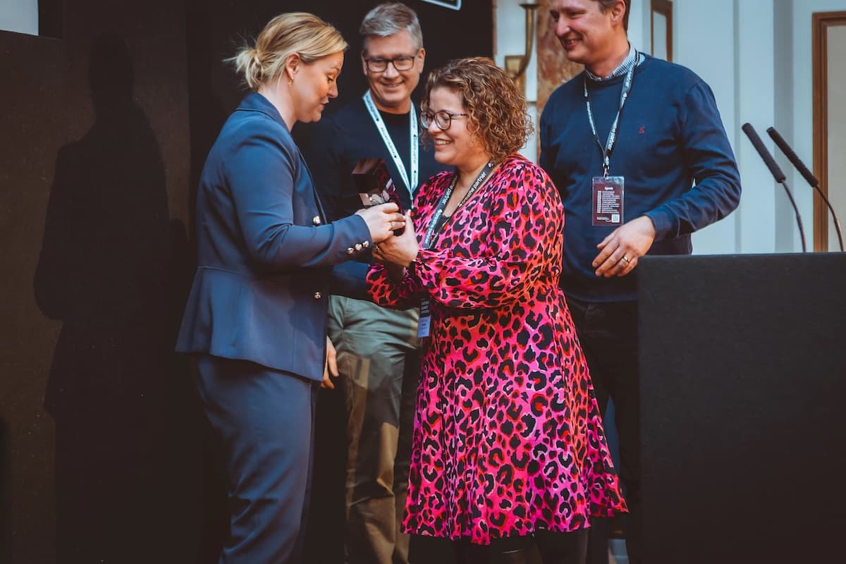 Nicci Birley and Rob Birley from Cornerstone Resources accepting a Breathe HR software award